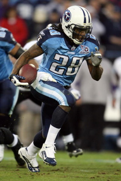 NASHVILLE, TN - JANUARY 10:  Running back Chris Johnson #28 of the Tennessee Titans runs the ball in the first quarter against the Baltimore Ravens during the AFC Divisional Playoff Game on January 10, 2009 at LP Field in Nashville, Tennessee.  (Photo by 