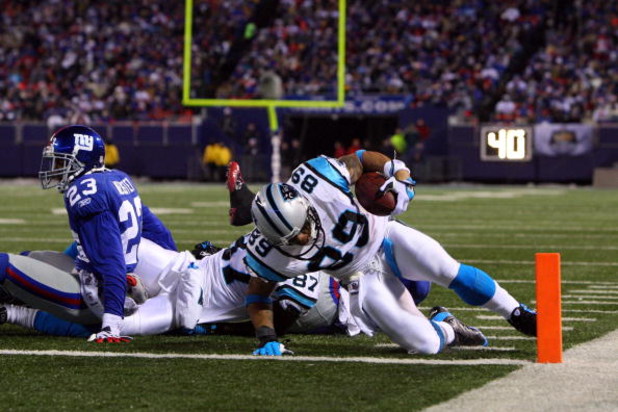 EAST RUTHERFORD, NJ - DECEMBER 21:  Wide receiver Steve Smith #89 of the Carolina Panthers  catches a pass just shy of the end zone against the New York Giants on December 21, 2008 at Giants Stadium in East Rutherford, New Jersey.  (Photo by Jim McIsaac/G