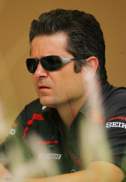 SAKHIR, BAHRAIN - APRIL 12: Honda Racing Sporting Director Gil de Ferran is interviewed in the paddock prior to the Bahrain Formula One Grand Prix at the Bahrain International Circuit on April 12, 2007 in Sakhir, Bahrain. (Photo by Bryn Lennon/Getty Ima