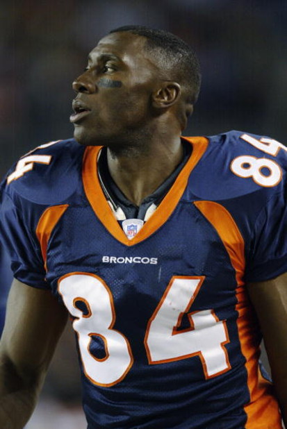 DENVER - DECEMBER 29:  Tight end Shannon Sharpe #84 of the Denver Broncos walks on the sideline during the game against the Arizona Cardinals at Invesco Field at Mile High on December 29, 2002 in Denver, Colorado.  The Broncos won 37-7.  (Photo by Brian B