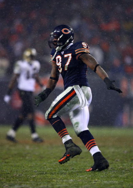 CHICAGO - JANUARY 21:  Mark Anderson #97 of the Chicago Bears celebrates against the New Orleans Saints during the NFC Championship Game January 21, 2007 at Soldier Field in Chicago, Illinois. The Bears won 39-14.  (Photo by Al Bello/Getty Images)