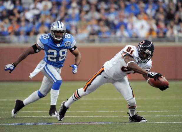 DETROIT - OCTOBER 05:  Rashied Davis #81 of the Chicago Bears makes a reception in front of Leigh Bodden #28 of the Detroit Lions during the third quarter at Ford Field on October 5, 2008 in Detroit, Michigan.  The Bears won 34-7.  (Photo by Harry How/Get