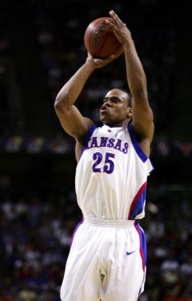 KANSAS CITY, MO - MARCH 12:  Michael Lee #25 of the Kansas Jayhawks shoots a jumper in the first half against the Oklahoma State Cowboys in the Semifinals of the Phillips 66 Big 12 Men's Basketball Tournament at Kemper Arena on March 12, 2005 in Kansas Ci