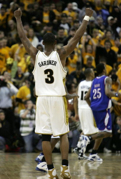 COLUMBIA, MO - JANUARY 16:  Thomas Gardner #3 of Missouri Tigers celebrates after they defeated the Kansas Jayhawks on January 16, 2006 at Mizzou Arena in Columbia, Missouri. Missouri defeated Kansas 89-86 in overtime.  (Photo by Elsa/Getty Images)