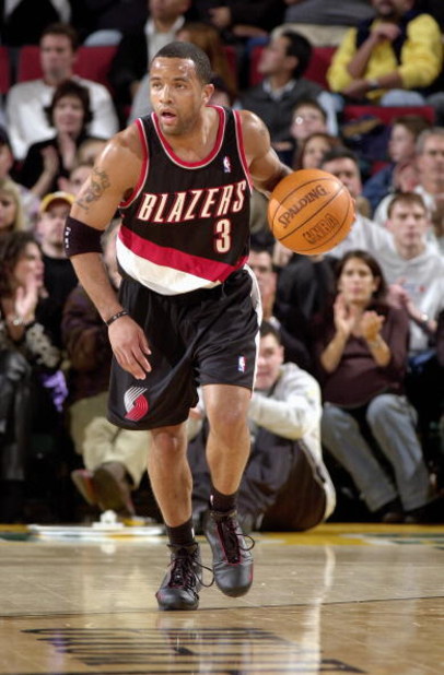 SEATTLE - NOVEMBER 7:  Damon Stoudamire #3 of the Portland Trail Blazers pushes the ball up court during the game against the Seattle Sonics in Key Arena on November 7, 2003 in Seattle, Washington.  The Sonics won 100-82.  NOTE TO USER: User expressly ack