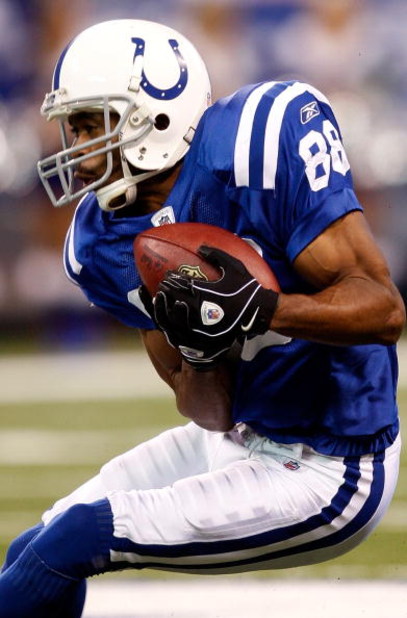 INDIANAPOLIS - DECEMBER 28:  Receiver Marvin Harrison #88 of the Indianapolis Colts makes a catch during the game against the Tennessee Titans at Lucas Oil Stadium December 28, 2008 in Indianapolis, Indiana.  (Photo by Jamie Squire/Getty Images)