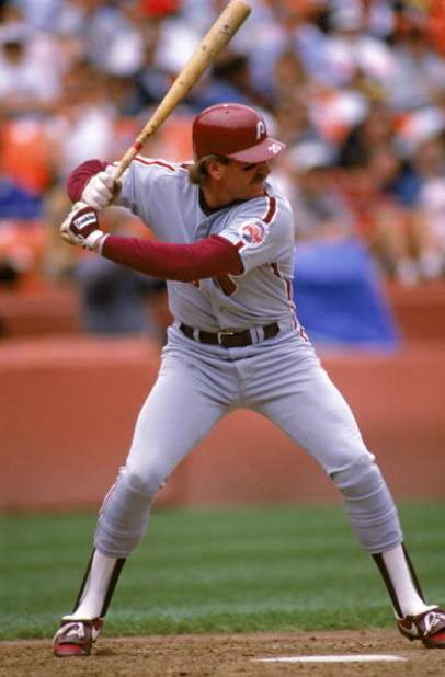 SAN FRANCISCO - 1989:  Mike Schmidt #20 of the Philadelphia Phillies steps into the pitch during a 1989 season game against the Giants at Candlestick Park in San Francisco, California. (Photo by Otto Greule Jr/Getty Images)
