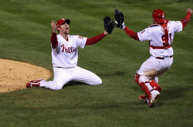 PHILADELPHIA - OCTOBER 29:  Brad Lidge #54 (L) and Carlos Ruiz #51 of the Philadelphia Phillies celebrate the final out of their 4-3 win to win the World Series against the Tampa Bay Rays during the continuation of game five of the 2008 MLB World Series o