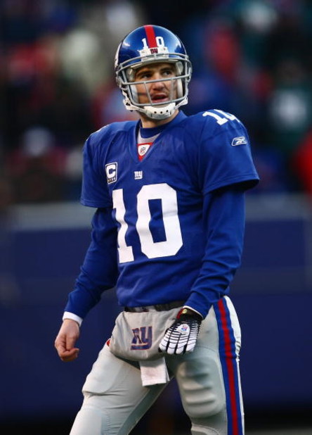 EAST RUTHERFORD, NJ -  JANUARY 11:  Eli Manning #10 of the New York Giants looks on against the Philadelphia Eagles during the NFC Divisional Playoff Game on January 11, 2009 at Giants Stadium in East Rutherford, New Jersey.  The Eagles defeated the Giant
