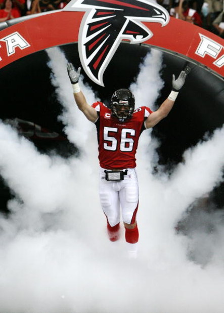 ATLANTA - SEPTEMBER 23: Linebacker Keith Brooking #56 of the Atlanta Falcons runs onto the field prior to taking on the Carolina Panthers at Georgia Dome September 23, 2007 in Atlanta, Georgia. The Panthers defeated the Falcons 27-20. (Photo by Doug Ben
