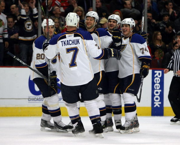 CHICAGO - JANUARY 21: Alex Steen #20, Keith Tkachuk #7 and T.J. Oshie #74 of the St. Louis Blues celebrate a first period goal against the Chicago Blackhawks on January 21, 2009 at the United Center in Chicago, Illinois. (Photo byJonathan Daniel/Getty Ima