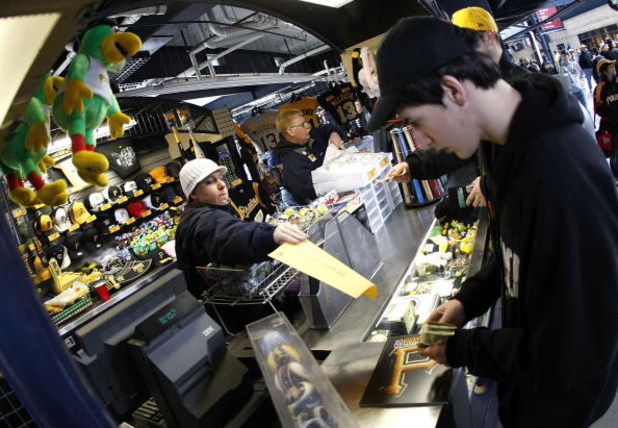 PITTSBURGH - APRIL 13:  Fans buy merchandise on opening day for the Pittsburgh Pirates prior to playing the Houston Astros at PNC Park April 13, 2009 in Pittsburgh, Pennsylvania.  (Photo by Gregory Shamus/Getty Images)