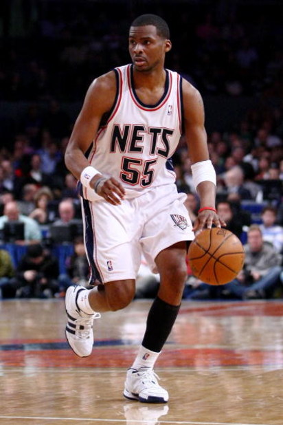 NEW YORK - MARCH 18:  Keyon Dooling #55 of the New Jersey Nets dribbles against the New York Knicks at Madison Square Garden March 18, 2009 in New York City. NOTE TO USER: User expressly acknowledges and agrees that, by downloading and/or using this Photo