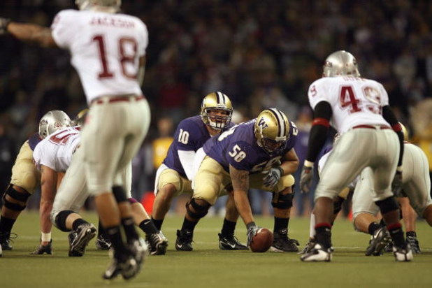 SEATTLE - NOVEMBER 24: Jake Locker #10 of the Washington Huskies at the line of scrimmage during the 100th Apple Cup game against the Washington State Cougars at Husky Stadium on November 24, 2007 in Seattle, Washington. (Photo by Otto Greule Jr/Getty Ima