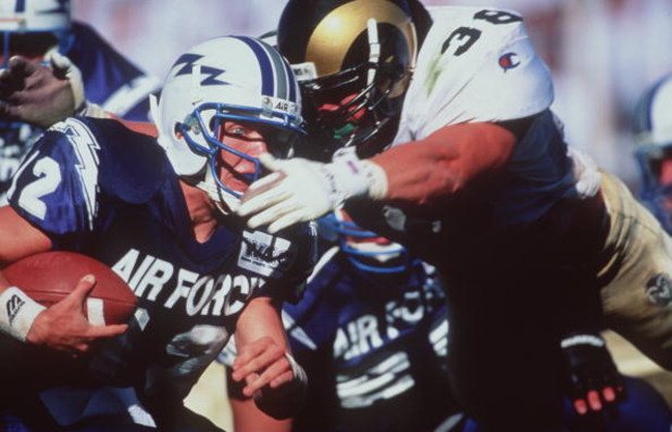 16 Sep 1995:  Quarterback Beau Morgan of the Air Force Falcons in action against Karl Ballard of the Colorado State Rams at Moby Arena in Fort Collins, Colorado.  Mandatory Credit: Mike Powell/Allsport