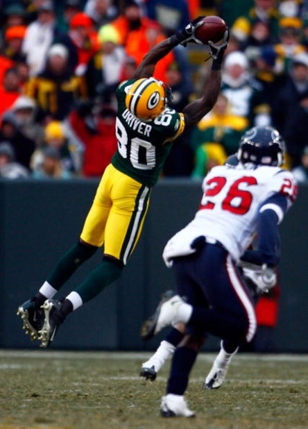 GREEN BAY, WI - DECEMBER 07:  Donald Driver #80 of the Green Bay Packers makes a reception in the second half against the Houston Texans at Lambeau Field on December 7, 2008 in Green Bay, Wisconsin. The Texans defeated the Packers 24-21.  (Photo by Jeff G