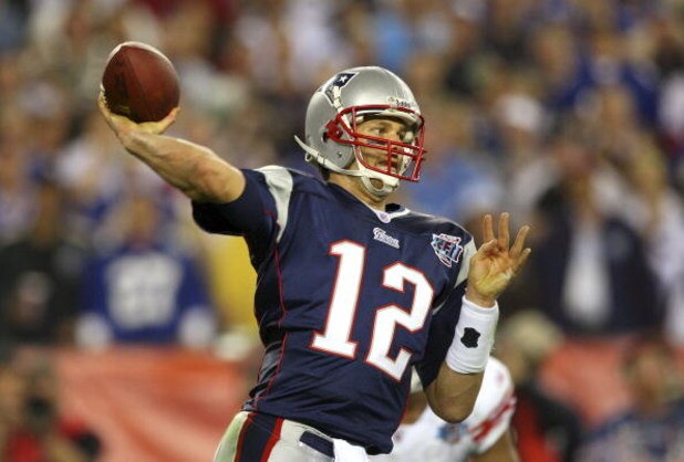 GLENDALE, AZ - FEBRUARY 03: Quarterback Tom Brady #12 of the New England Patriots drops back to pass against the New York Giants the second half of Super Bowl XLII on February 3, 2008 at the University of Phoenix Stadium in Glendale, Arizona. The Giants