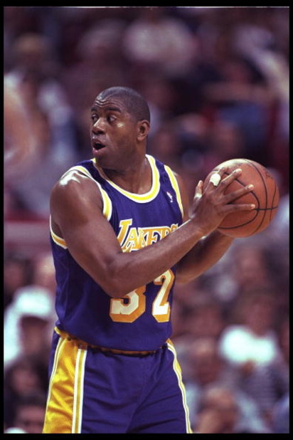 26 Mar 1996:  Guard Magic Johnson of the Los Angeles Lakers works against the Orlando Magic during a game played at the Orlando Arena in Orlando, Florida.  The Lakers won the game, 113-91. Mandatory Credit: ALLSPORT USA  /Allsport