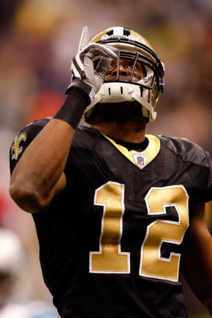 NEW ORLEANS - DECEMBER 28:   Marques Colston #12 of the New Orleans Saints points to the sky during the game against the Carolina Panthers on December 28, 2008 at the Superdome in New Orleans, Louisiana.  (Photo by Chris Graythen/Getty Images)