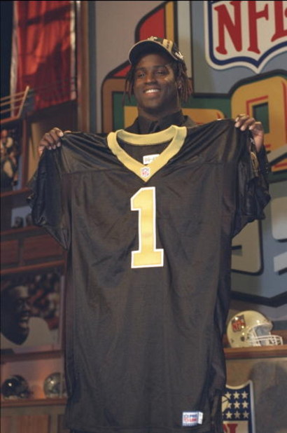 17 Apr 1999: The fifth draft pick Ricky Williams holds his new New Orleans Saints jersey during the NFL Draft at the Madison Square Garden in New York, New York.