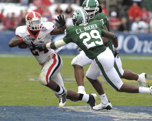 ORLANDO, FL - JANUARY 1: Running back Knowshon Moreno #24 of the University of Georgia rushes upfield against the Michigan State Spartans at the 2009 Capital One Bowl at the Citrus Bowl on January 1, 2009 in Orlando, Florida.  (Photo by Al Messerschmidt/G