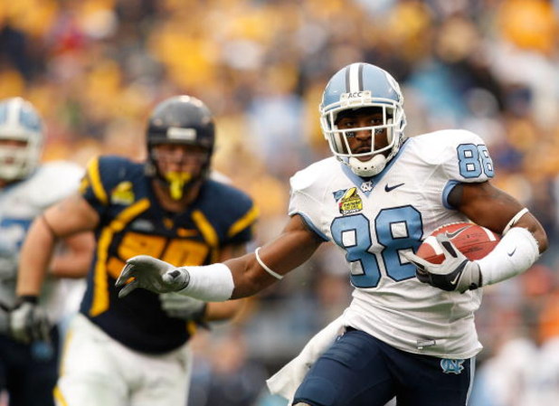 CHARLOTTE, NC - DECEMBER 27:  Hakeem Nicks #88 of the North Carolina Tar Heels runs with the ball against the West Virginia Mountaineers during the Meineke Car Care Bowl on December 27, 2008 at Bank of America Stadium in Charlotte, North Carolina.  (Photo
