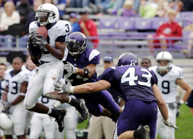 EVANSTON, IL - SEPTEMBER 24:  Wide receiver Deon Butler #3 of the Penn State Nittany Lions grabs a 13-yard pass against safety Herschel Henderson #24 of the Northwestern Wildcats with just over a minute left in the fourth quarter on September 24, 2005 at 
