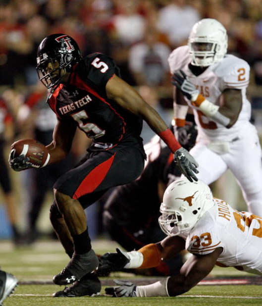 LUBBOCK, TX - NOVEMBER 01:  Michael Crabtree #5 of the Texas Tech Red Raiders carries the ball after making a reception during the first half of the game against the Texas Longhorns on November 1, 2008 at Jones Stadium in Lubbock, Texas.  (Photo by Jamie 