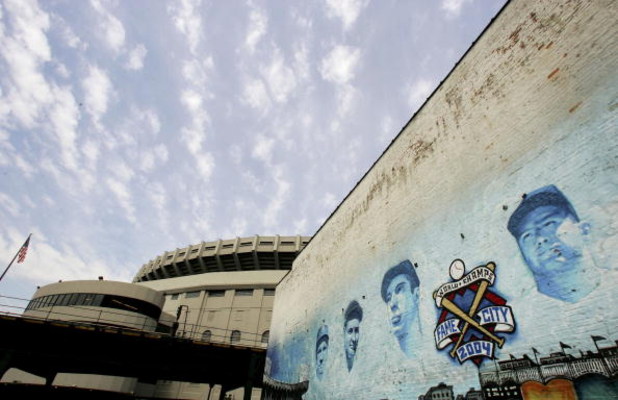 NEW YORK - APRIL 11: Subway tracks at left lead to Yankee Stadium and a wall with the portraits of (R-L) Mickey Mantle, Joe DiMaggio, Lou Gehrig and Babe Ruth before the home opener against the Kansas City Royals at Yankee Stadium April 11, 2006 in the B