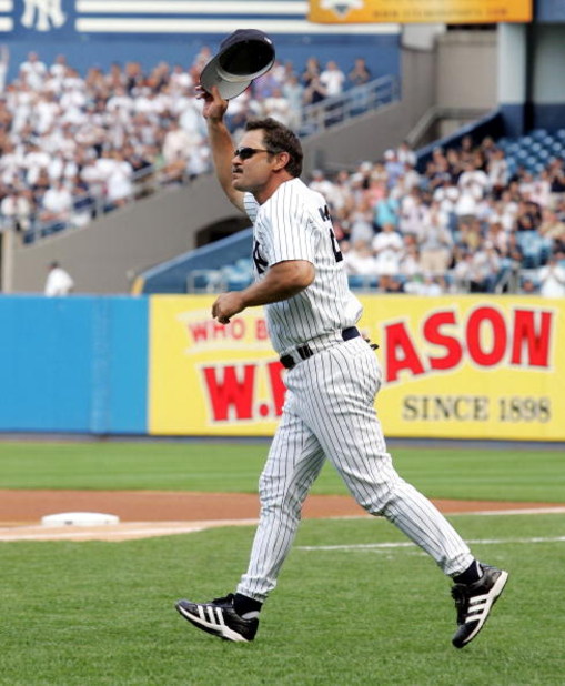 NEW YORK - JULY 9: Don Mattingly salutes the crowd after being introduced during New York Yankees 59th annual old timers day before the start of the Yankees game against the Cleveland Indians on July 9, 2005 at Yankee Stadium in the Bronx borough of New Y