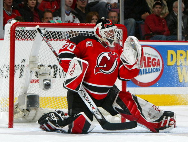 EAST RUTHERFORD, NJ - MAY 05:  Goaltender Martin Brodeur #30 of the New Jersey Devils makes save against the Ottawa Senators during Game Five of the 2007 Eastern Conference Semifinals at the Continental Airlines Arena in the Meadowlands on May 5, 2007 in 