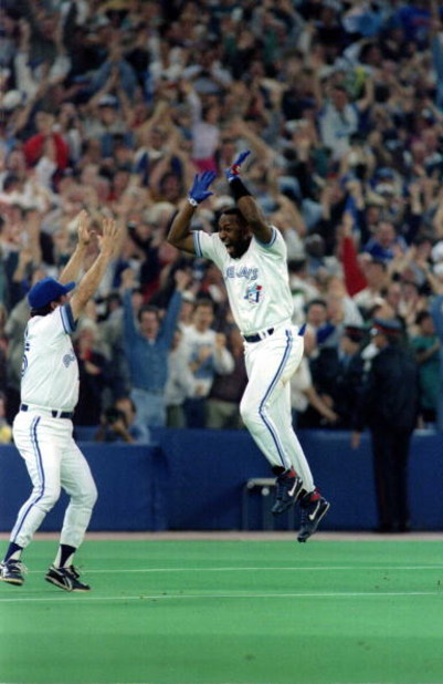 23 Oct 1993: Joe Carter of the Toronto Blue Jays celebrates his 9th inning, 3 run homerun to defeat the Philadelphia Phillies 8-6 to win the 1993 World Series at the Skydome in Toronto, Canada.