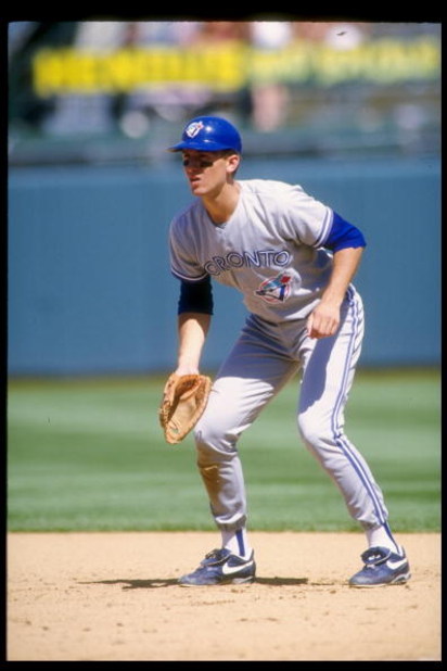 1 Sep 1993:  Infielder John Olerud of the Toronto Blue Jays stands in position during a game against the Oakland Athletics at the Oakland Coliseum in Oakland, California.  Mandatory Credit: Otto Greule  /Allsport