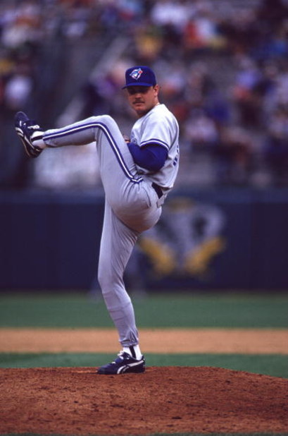 30 May 1993: Duane Ward of the Toronto Bluejays winds up to pitch against the Oakland A''s during their game in Oakland, California.