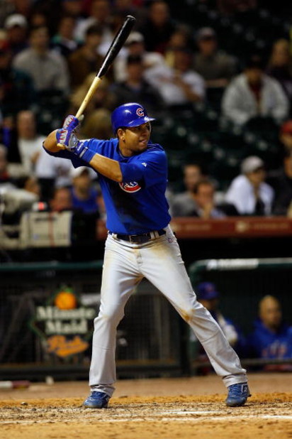 HOUSTON - APRIL 06:  Aramis Ramirez #16 of the Chicago Cubs bats against the Houston Astros during the Opening Day game on April 6, 2009 at Minute Maid Park in Houston, Texas.  (Photo by Chris Graythen/Getty Images)