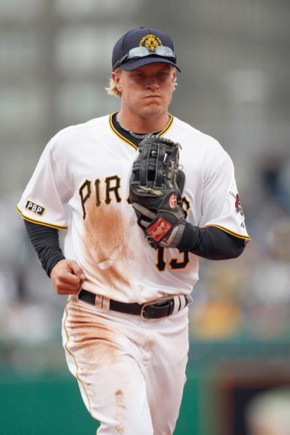 PITTSBURGH - APRIL 13:  Nate McLouth #13 of the Pittsburgh Pirates jogs off the field during the Opening Day game against the Houston Astros at PNC Park on April 13, 2009 in Pittsburgh, Pennsylvania.  (Photo by: Gregory Shamus/Getty Images)