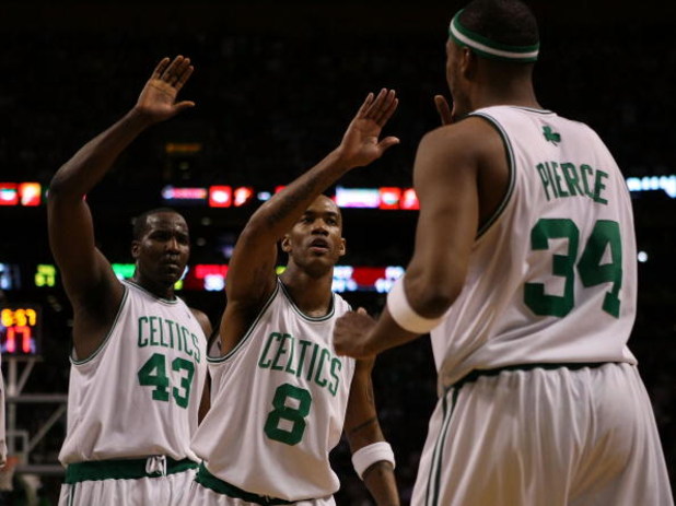 BOSTON - MAY 02:  Stephon Marbury #8 and Kendrick Perkins #43 of the Boston Celtics celebrate with teammate Paul Pierce #34 after Pierce drew the foul in the first half against the Chicago Bulls in Game Seven of the Eastern Conference Quarterfinals during