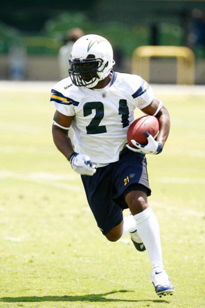 SAN DIEGO - MAY 03: Running back LaDainian Tomlinson #21 of the San Diego Chargers runs upfield during a practice drill at minicamp at the Chargers training facility on May 3, 2009 in San Diego, California. (Photo by Kevin Terrell/Getty Images)
