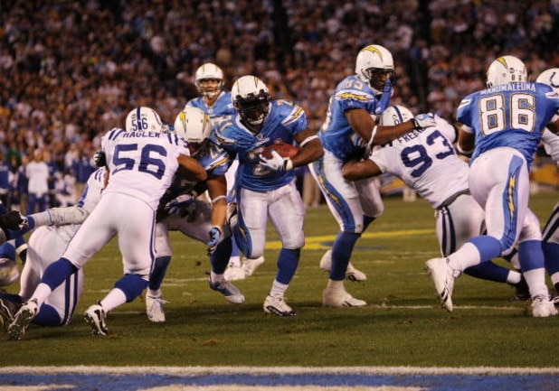 SAN DIEGO - JANUARY 03: LaDainian Tomlinson #21 of the San Diego Chargers rushes for a touchdown against the Indianapolis Colts in the AFC Wild Card Game on January 3, 2009 at Qualcomm Stadium in San Diego, California. (Photo by Stephen Dunn/Getty Image