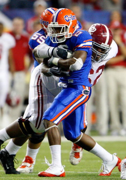 ATLANTA - DECEMBER 06:  Terrence Cody #62 of the Alabama Crimson Tide tackles Jeffery Demps #2 of the Florida Gators during the SEC Championship on December 6, 2008 at the Georgia Dome in Atlanta, Georgia.  (Photo by Kevin C. Cox/Getty Images)