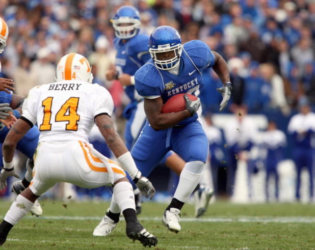 LEXINGTON, KY - NOVEMBER 24: Rafael Little #22 of the Kentucky Wildcats carries the ball during the SEC game against Eric Berry #14 of the Tennessee Volunteers at Commonwealth Stadium November 24, 2007 in Lexington, Kentucky. Tennessee won the game 52-50 