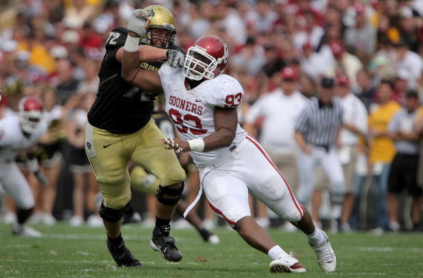 BOULDER, CO - SEPTEMBER 29:  Devin Head #93 of the Colorado Buffaloes block Gerald McCoy #93 of the Oklahoma Sooners at Folsom Field on September 29, 2007 in Boulder, Colorado. Colorado defeated Oklahoma 27-24.  (Photo by Doug Pensinger/Getty Images)