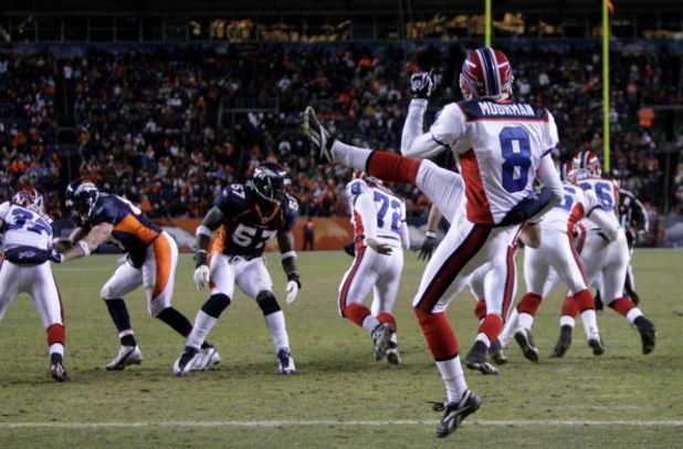 DENVER - DECEMBER 21:  Punter Brian Moorman #8 of the Buffalo Bills punts the ball from his own endzone against the Denver Broncos at Invesco Field at Mile High on December 21, 2008 in Denver, Colorado. The Bills defeated the Broncos 30-23.  (Photo by Dou