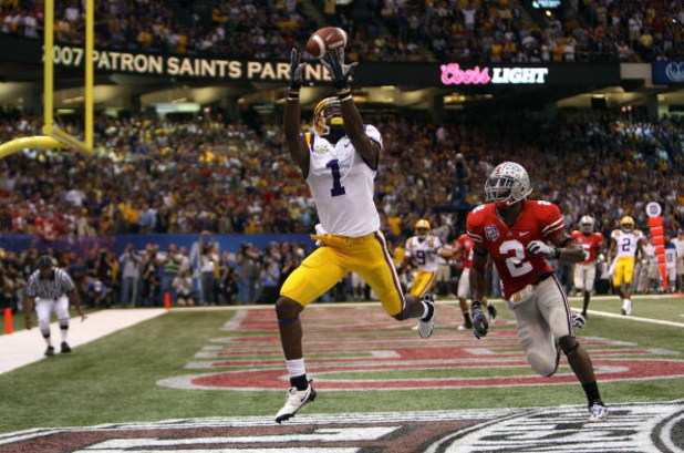 NEW ORLEANS - JANUARY 07:  Brandon LaFell #1 of the Louisiana State University Tigers hauls in a 10-yard touchdown pass in front of Malcolm Jenkins #2 of the Ohio State Buckeyes during the second quarter of the AllState BCS National Championship on Januar