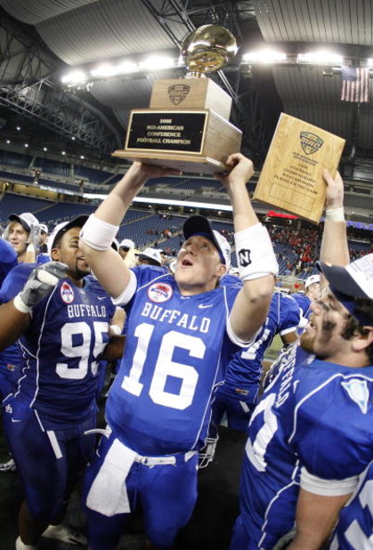 DETROIT - DECEMBER 05: Drew Willy #16 of the Buffalo Bulls celebrates with teammates the MAC Championship after defeating the Ball State Cardinals on December 5, 2008 at Ford Field in Detroit, Michigan. (Photo by Gregory Shamus/Getty Images)