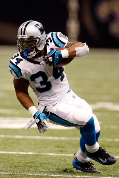 NEW ORLEANS - DECEMBER 28:  DeAngelo Williams #34 of the Carolina Panthers carries the ball during the game against the New Orleans Saints on December 28, 2008 at the Superdome in New Orleans, Louisiana.  (Photo by Chris Graythen/Getty Images)