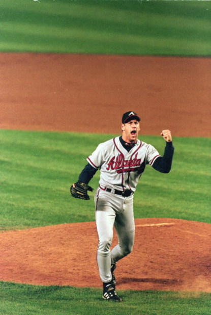 15 Oct 1999: Relief pitcher John Rocker #49 of the Atlanta Braves celebrates on the mound during Game 3 of the National League Championship Series against the New York Mets at Shea Stadium in New York, New York. The Braves defeated the Mets 1-0.