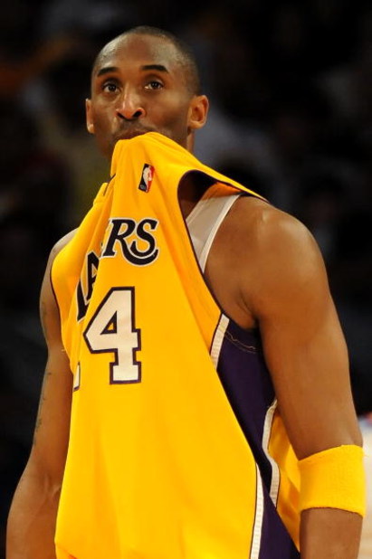 LOS ANGELES, CA - MAY 06:  (EDITORS NOTE: THIS IMAGE HAS BEEN RE-CROPPED) Kobe Bryant #24 of the Los Angeles Lakers reacts in the second quarter against the Houston Rockets in Game Two of the Western Conference Semifinals during the 2009 NBA Playoffs at S