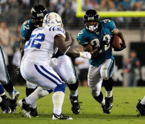 JACKSONVILLE, FL - DECEMBER 18:  Maurice Jones-Drew #32 of the Jacksonville Jaguars runs for yardage during the game against the Indianapolis Colts at Jacksonville Municipal Stadium on December 18, 2008 in Jacksonville, Florida.  (Photo by Sam Greenwood/G
