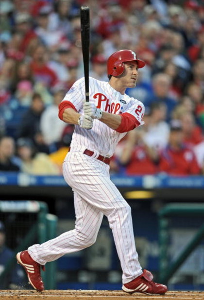 PHILADELPHIA - APRIL 17: Chase Utley #26 of the Philadelphia Phillies watches the ball going into the stands while hitting a 2 run home-run in the bottom of the first inning during the game against the San Diego Padres on April 17, 2009 at Citizens Bank P